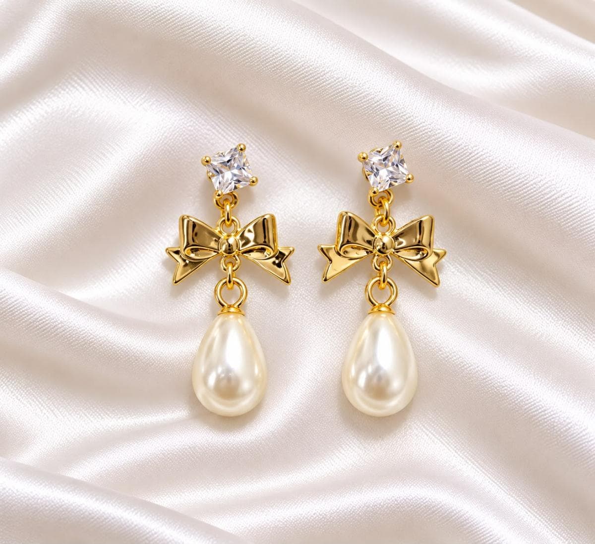 Golden Bow Pearl Drop Earrings